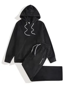 Black fleece men's hooded sweatshirt and sweatpants set for winter chill
