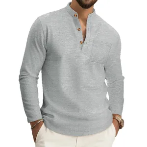 Men's classic grey textured long-sleeve Henley shirt featuring a chest pocket design