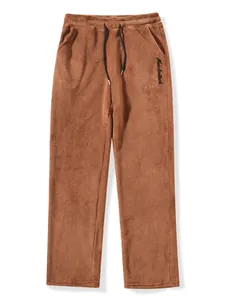 Front view of men's brown fleece jogger pants with drawstring and Muscleattack embroidery