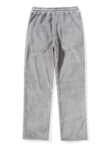 Flat lay detail of grey fleece loungewear pants showing soft plush fabric texture