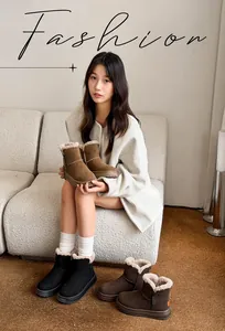 Asian model sitting on sofa displaying various colors of warm fur-lined snow boots