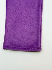 Close-up detail of soft purple coral fleece fabric texture for men's winter tracksuit