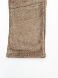 Close-up detail of soft grey plush fabric hem on men's casual sports lounge pants