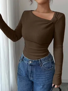 Elegant brown ribbed knit long sleeve top with a unique asymmetric neckline for women
