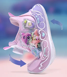 Close-up view of the flexible sole on pink purple girls' sports sneakers with cartoon design