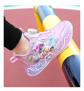 Close-up of pink girls' sports shoe with rotary buckle and cartoon character decoration