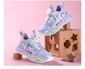 Close-up of purple girls' LED light-up sneakers with a convenient rotary buckle system.