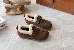 Detailed view of brown matte suede children's Birkenstock shoes with cozy fleece lining