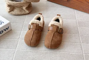 Detailed view of the retro brown suede kids shoes featuring warm white fleece lining