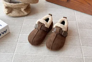 Detailed view of retro frosted children's Birkenstock shoes with warm fleece lining