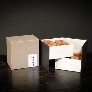 Natural sandalwood backflow incense cones set in a premium double-layer gift box