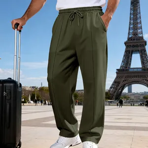 Close-up of olive green men's straight-leg knit pants featuring a drawstring waist