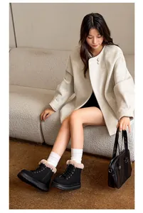 Stylish black winter snow boots for women featuring plush lining and platform soles