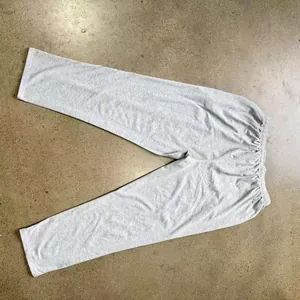 Casual grey knitted lounge pants with elastic waist for men in a relaxed straight fit
