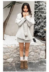 Stylish brown platform snow boots with warm fur lining shown in a winter lifestyle scene.
