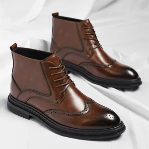 Brown men's Brogue ankle boots with decorative wingtip carving on white draped background