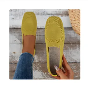 Detailed top view of comfortable yellow knit round-toe loafers for a casual summer look
