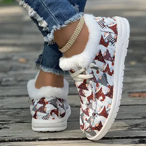 Detail shot of Christmas gnome loafers with soft faux fur trim and thick white sole.