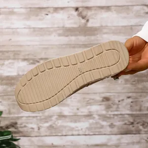 Detailed close-up of the non-slip rubber sole for women's lightweight wedge shoes