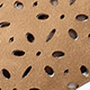Macro detail of laser cut floral hollow pattern on brown breathable women's shoes