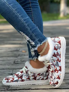 Detailed side view of winter gnome print sneakers featuring cozy white faux fur lining.