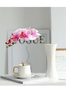 Exquisite 3D touch artificial phalaenopsis orchid flower in a white vase for home decor.