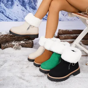 Warm winter snow boots with thick platform soles and faux fur lining in multiple colors.
