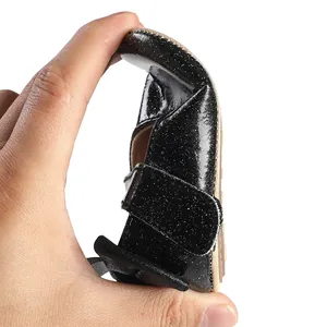 Detail shot of flexible glitter black baby walking shoe showing its soft bendable sole