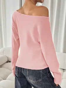 Detailed back view of a pink off-the-shoulder long sleeve knitted top for casual wear.