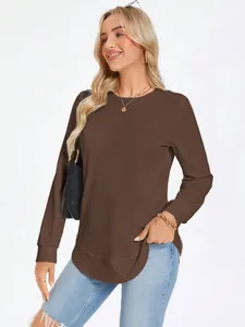 Professional close-up of the brown waffle-knit crewneck top with a rounded hem design