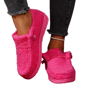 Vibrant pink fleece-lined warm loafers for women featuring cozy plush winter texture