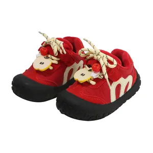 Vibrant red toddler shoes with cute apple decor and warm plush lining for winter