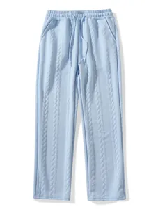 Vista frontale di pantaloni da uomo azzurri testurizzati con coulisse e gamba dritta