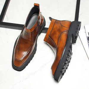 Bottines Chelsea pour hommes en cuir marron avec détails richelieu et semelle