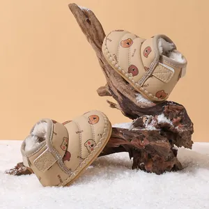 Cozy beige baby winter snow boots featuring cute bear patterns and warm fleece lining