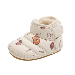 Cozy cream baby snow boots with warm fleece lining and cute cartoon bear prints