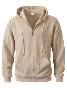 Close-up of a beige men's zip-up hoodie featuring a cable knit texture and hood