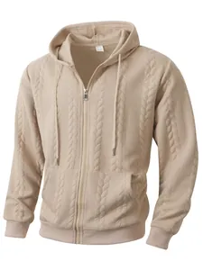 Detailed view of beige cable-knit zip-up hoodie with textured pattern and drawstring hood