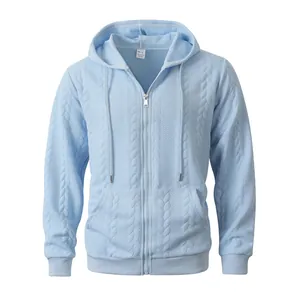 Front view of light blue zip-up hoodie featuring a unique embossed cable knit texture