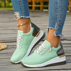 Mint green women's casual platform sneakers with side zipper and metallic accents