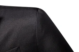 Macro view of black business suit shoulder showing fine fabric texture and stitching