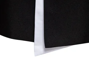 High-resolution close-up of premium black and white slim fit business suit fabric texture