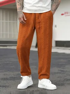 Pantaloni jogger da uomo arancioni a treccia con coulisse e vestibilità ampia casual.