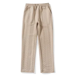 Men's beige sports casual drawstring wide-leg straight pants with cable knit texture.