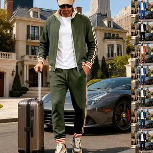 Detail showing various colors of men's heavy fleece tracksuit set with side stripes