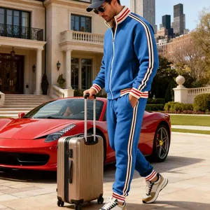 Close-up of blue men's fleece tracksuit set with red and white stripes in luxury outdoor.