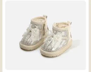 Sparkling rhinestone baby snow boots with pearl bow and warm fleece lining details