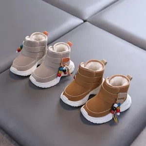 Warm fleece-lined winter snow boots for toddlers with colorful tassel decoration