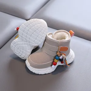 Warm beige fleece-lined winter snow boots for toddlers with non-slip soles and beads