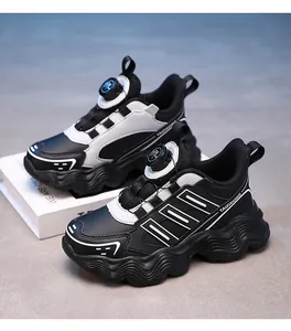 Side view of children's chunky sneakers with rotary buckle system and leather finish